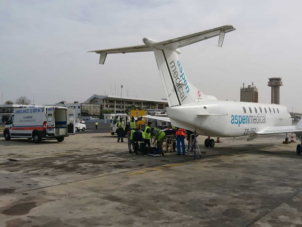 Aspen Medical workers load equipment onto the company's 1900c (ZS-TFZ) aircraft